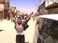 CBS Evening News with Scott Pelley - U.N. tours Syria city turned war zone