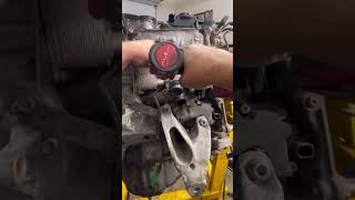 Removing shaft driven belt drive engine water pump thermostat housing Audi VW 2.0t