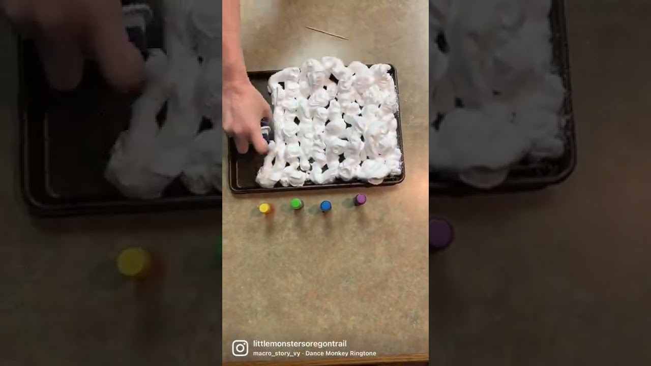 Making marble eggs with shaving cream and food coloring