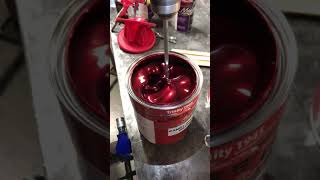 Stirring candy apple red car paint