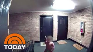 Toddler seen waving gun at apartment complex in security video