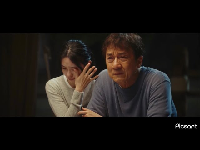 Jackie Chan crying while watching his old stunts with his daughter class=
