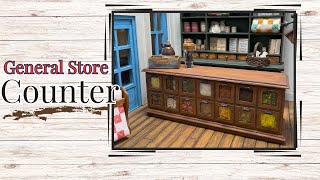 Watch me build the miniature General Store Counter with cardstock.