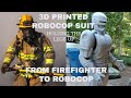 3d printed robocop suit from firefighter to robocopholding the robocop legs up