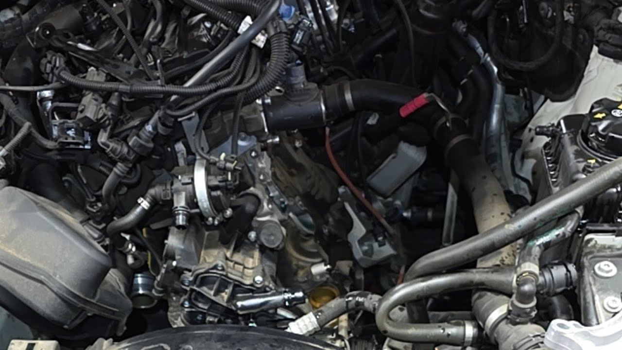BMW B46 engine replace water pump support - YouTube