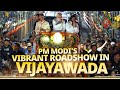 Vijaywadas warm welcome for pm modi as he holds a vibrant roadshow