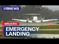 Plane lands successfully at NSW airport following landing gear failure | 9 News Australia