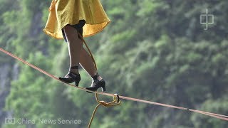 A vertigo-inducing high heel slackline competition held in China