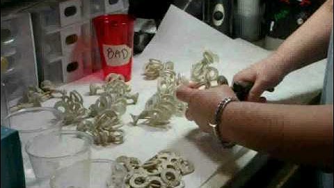 Lost Wax Casting Step 8 of 9 Cutting the charms off of the sprues