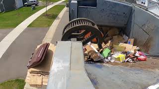 McNeilus ZR Hopper POV: Garbage Truck Packing Recycle Wealth