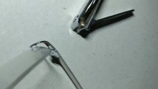 Changing rimless eyeglass compression bushings without any special pliers