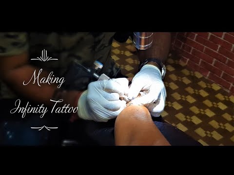 Video: Kaip Pasidaryti „begalybės“tatuiruotę
