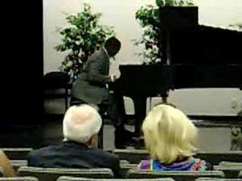 samuel hendricks on the piano