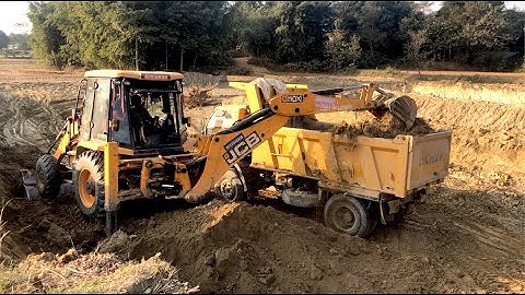 JCB Backhoe Loader Machine Loading A Soil In Tripper Dump - JCB & Tripper Dump Video