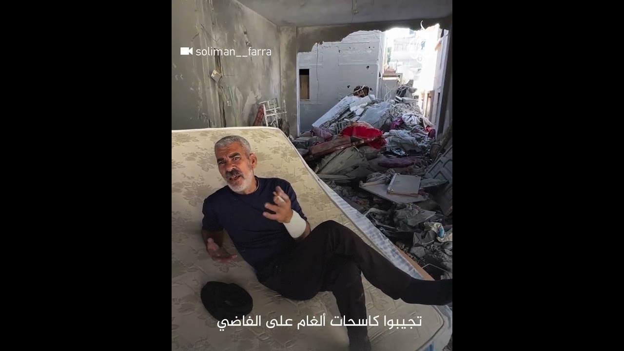 فلسطيني من فوق ركام منزله: لن نترك بلدنا