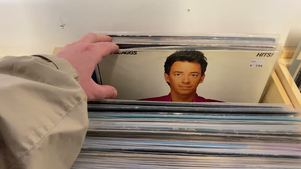 20210529 browsing some LPs on a Finnish flea market