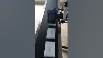 Hệ thống in date tin date trên băng tải tự độngrên băng tải tự động