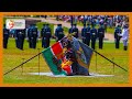 Uhuru hands regimental flag to the 19th Kenya Rifle Battalion