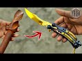 Rusted drill bit forged into a 24k gold plated butterfly knife
