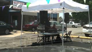 DJ JIMMY JAM from WNAA 90.1 rockin' at the Custom Care Car Wash hot dog sale