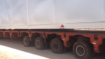 heavy transport 10 axle line modular trailer with spacer loading LINDE cool box