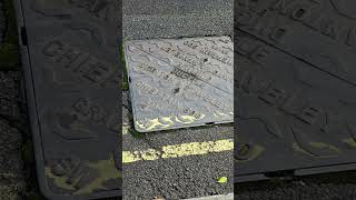 The sound effect of a generator and manhole road repairs