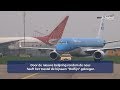 KLM-toestel met nieuwe beschildering geland op Schiphol