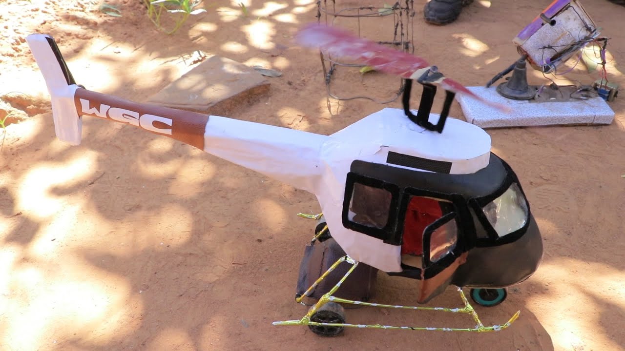 KIJANA  WA KIGOMA ATENGENEZA MFANO HELICOPTER BAADA YA GARI NA PIKIPIKI YAKE ''SIBAHATISHI MIMI''