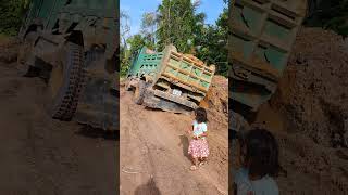 Hyundai dump truck stuck mud