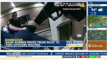 Caught on Cam: Bank Robber Drops From Roof in Front of Officers