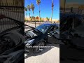 Instant regret man sits down hard on roof of tesla and shatters the glass