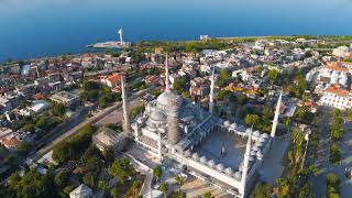 Istanbul, Turkey. Blue Mosque courtyard and minarets at Sultanahmet Square. Morning sun light on ...