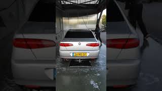 Daughter cleaning the Alfa166. 2018