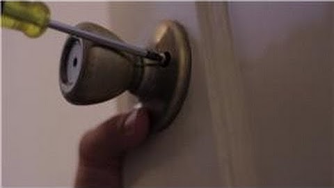 Construction Work : How to Fix a Loose Door Knob