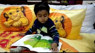 Rihaan Reading Brown Bear Book