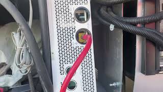 Installing a LiTime 460AH lithium battery under the step of a 2018 Leisure Travel Van Unity