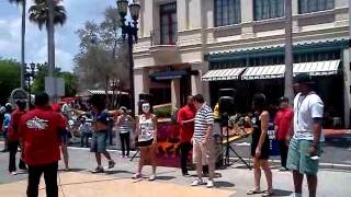 Sam break dances at universal studios