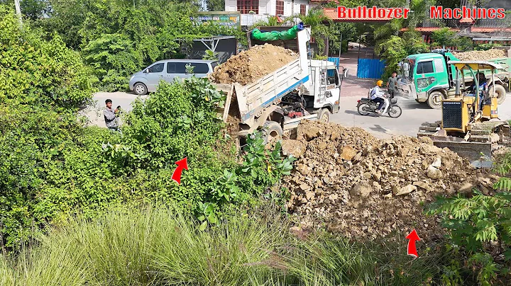 Nicely Start New Landfill Use Dump Truck Unload Stone with Skill D20P Dozer Pushing into Flood Land