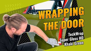 Vinyl wrapping. Door wrapping with high-gloss wrap, TeckWrap Khaki Green