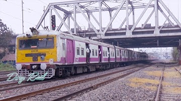 Two old but beautiful EMU local train back to back crossing in the morning