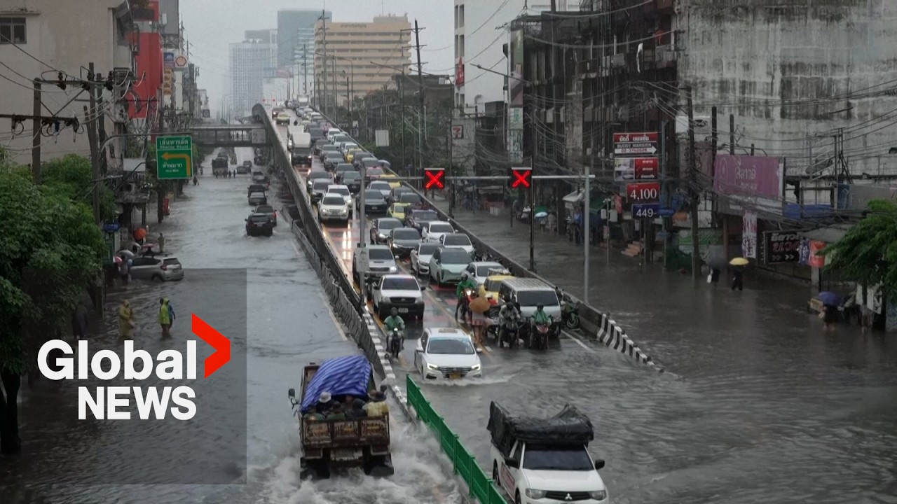 Stunned by the Deluge: Bangkok Faces Extensive Flooding After 24 Hours of Rain