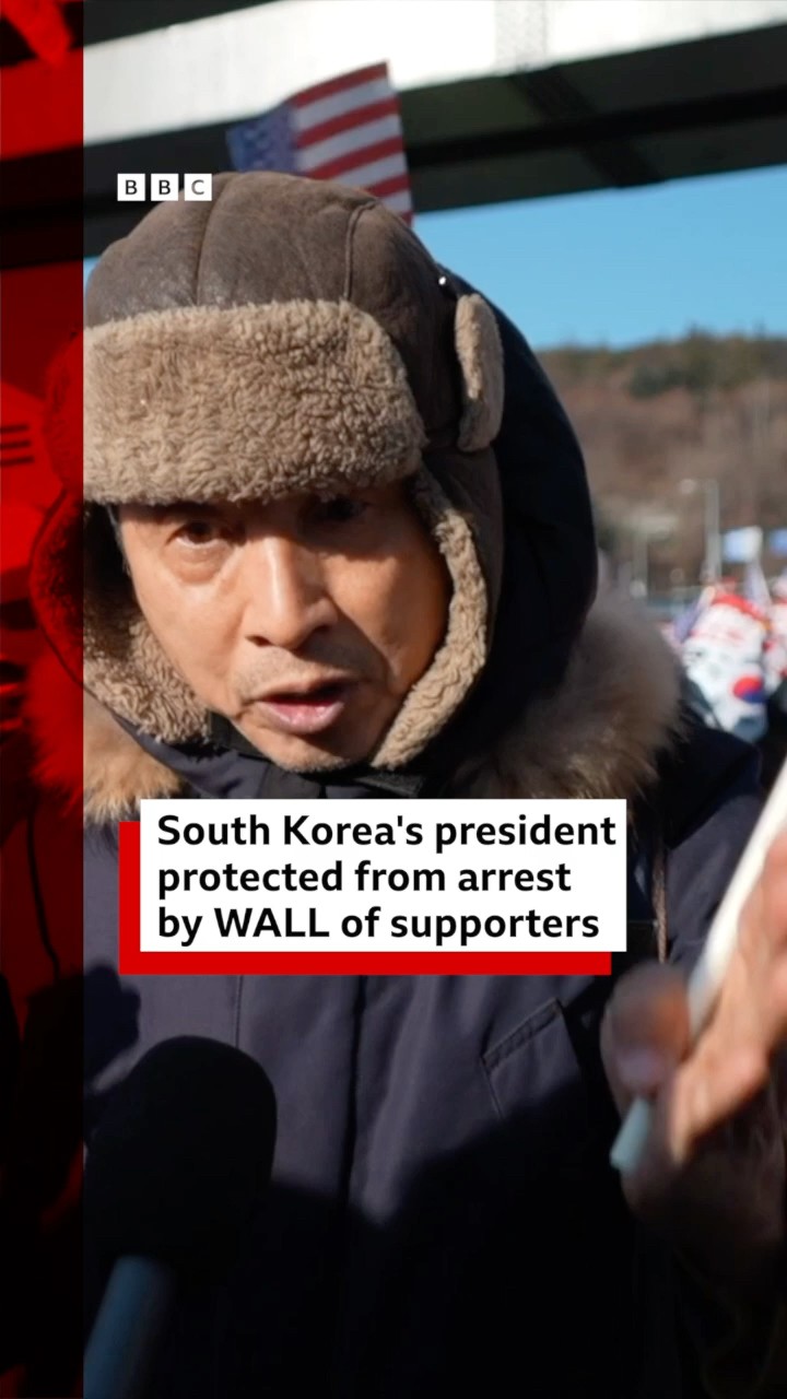 South Korea's impeached president protected from arrest by wall of supporters. #SouthKorea #BBCNews