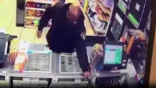 ROBBER WITH A FAKE GUN GETS SHOT BY ARMED SECURITY GUARD