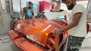 Bodywork on this Candy Tangerine Cutlass