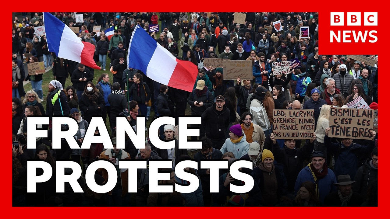 French police arrest 135 people, as tens of thousands protest across country | BBC News