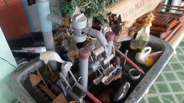 hòn non bộ kết hợp guồng nước giã gạo tây nguyên