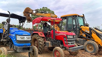 JCB 3DX Backhoe Loader Loading Mud In Mahindra DI And Sonalika Tractor Trolley For Road Construction