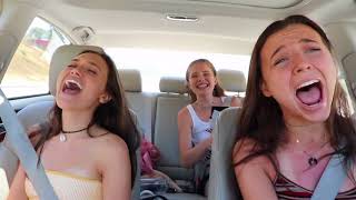 the girdies singing in the car for 4 minutes