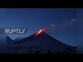 Russia's tallest volcano erupts lighting up sky in Siberia