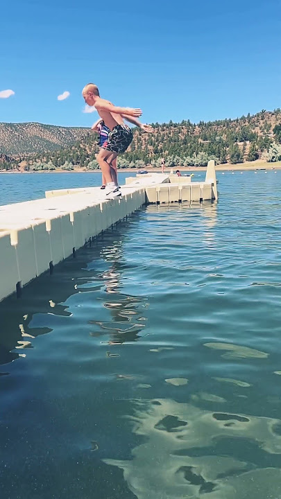 Back flipping in my batwrapz camo fish shorts #backflip #lakedays #batwrapz #slomotion